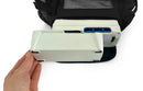 Hand inserting battery into Inogen One G3 portable oxygen concentrator in carry bag
