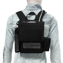 Person wearing a black oxygen concentrator backpack with shoulder straps and nasal cannula tubing